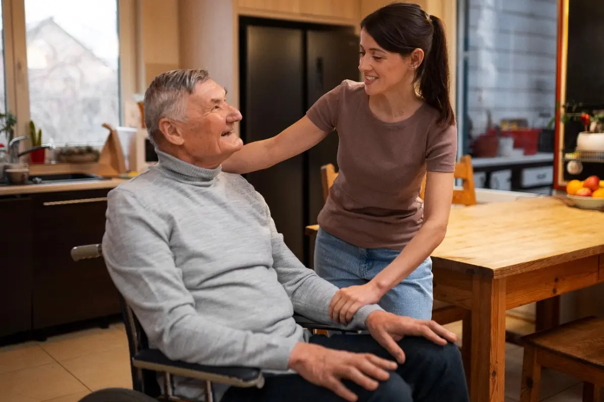 Image shows care assitant gives the love and care to the patient